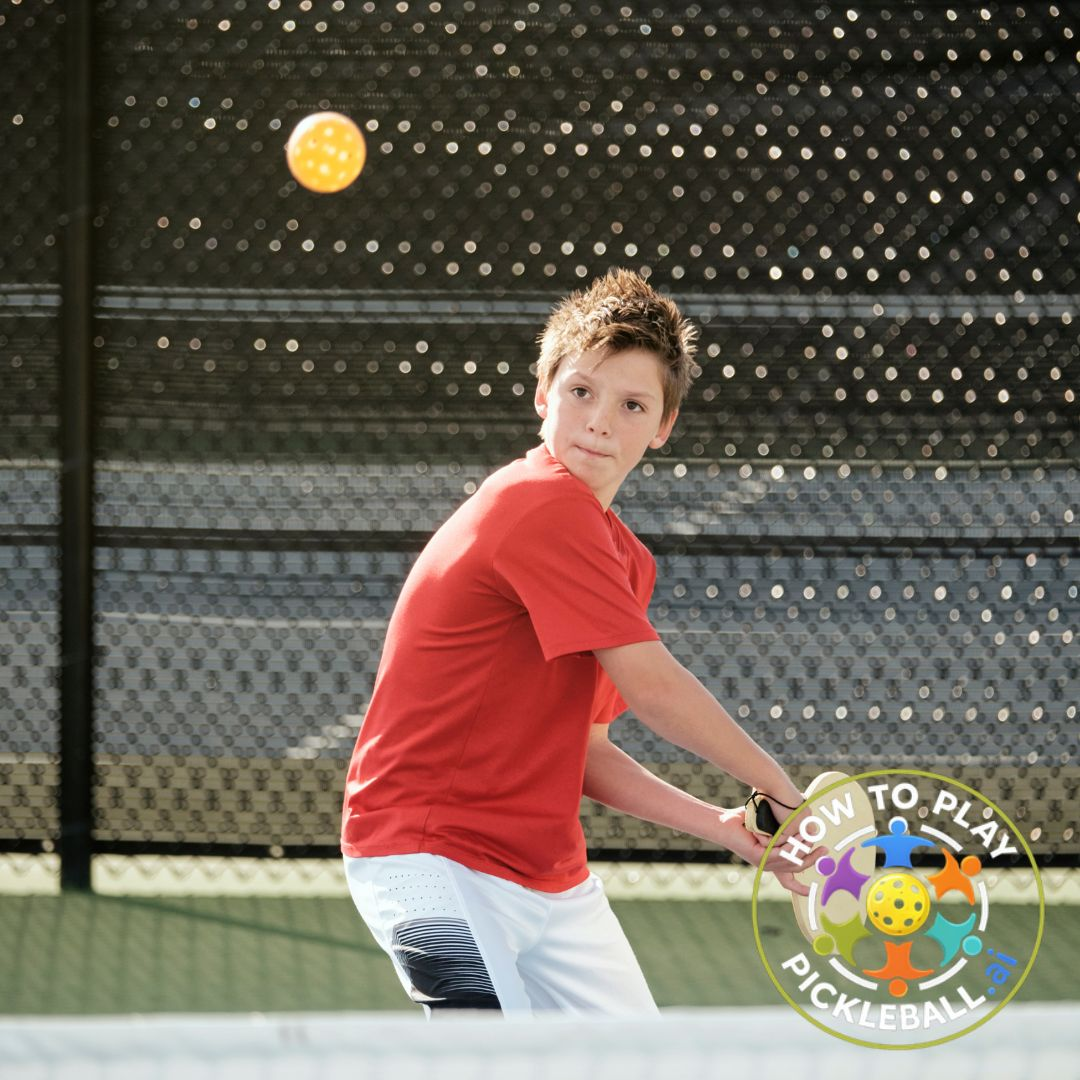 pickleball-youth-boy-backhand-outdoor