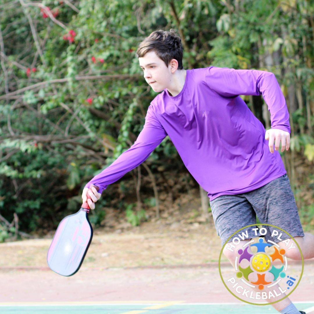 pickleball-youth-boy-low-dink-reach
